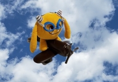 Nibbles the book monster flying in an airplane